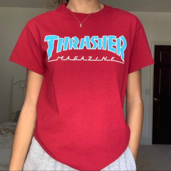 black thrasher shirt with red writing